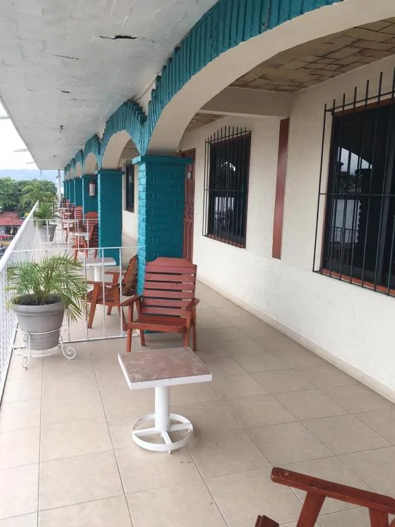 Hotel Arcos balcony with turquoise arches in Catemaco